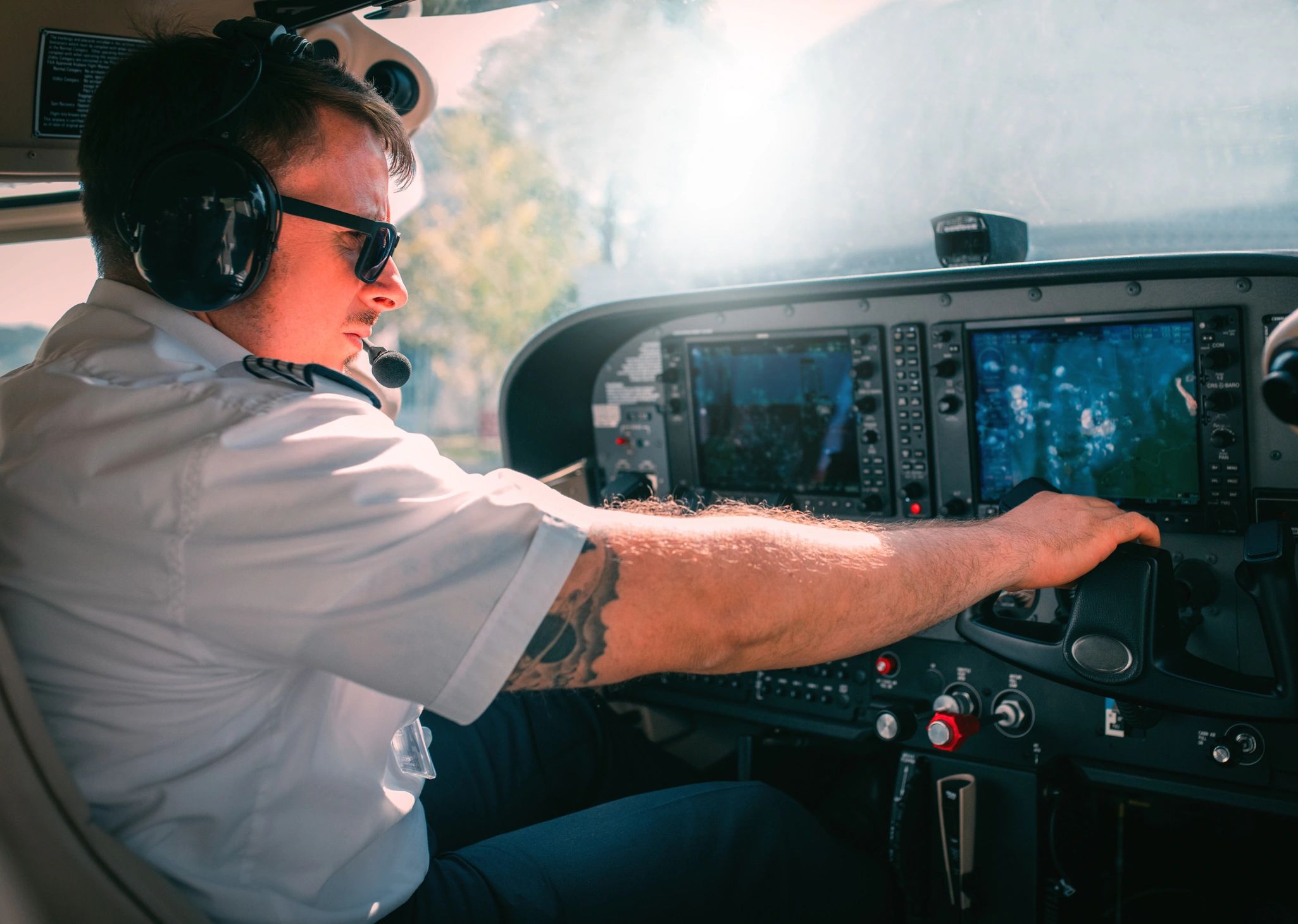 Pilot performing a preflight check before takeoff