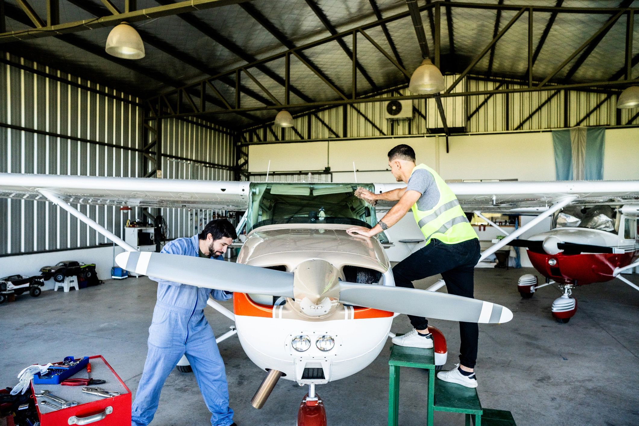 Aircraft maintenance scene in a hangar
